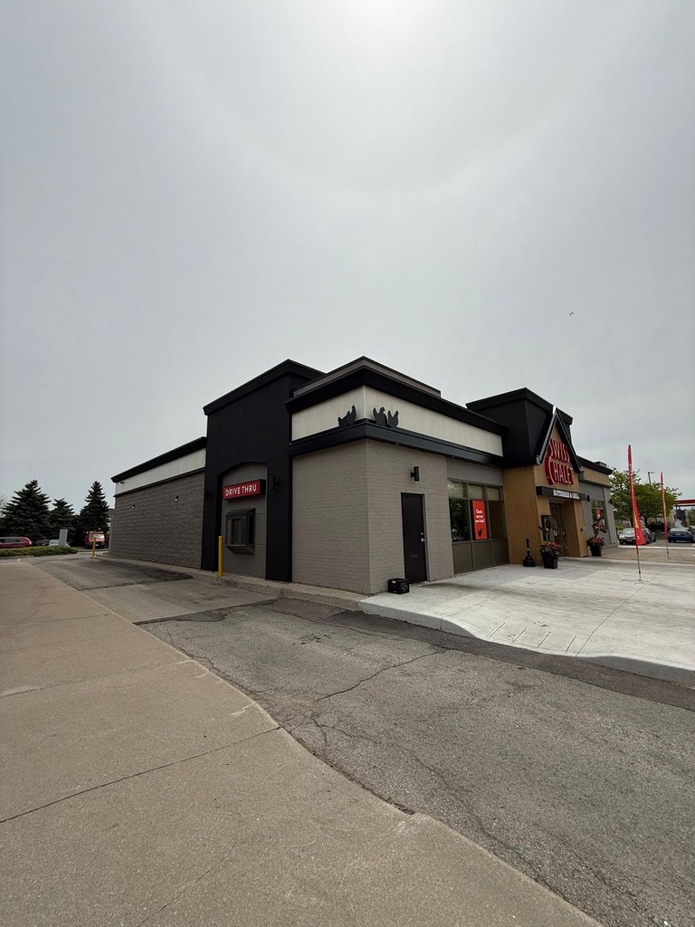 Side and entrance of a painted commercial building